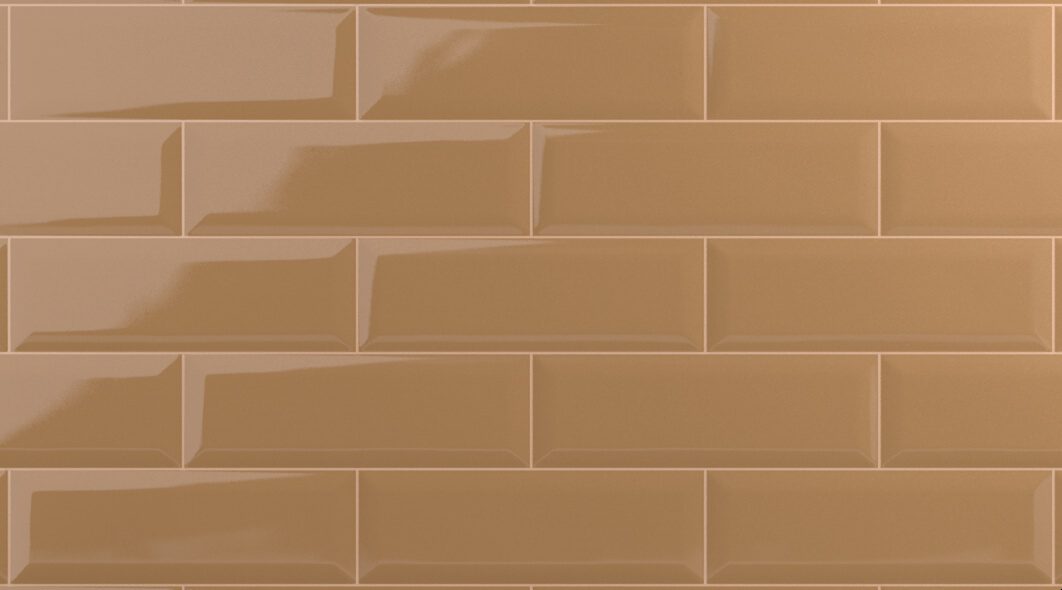 A close up of the brown tile wall