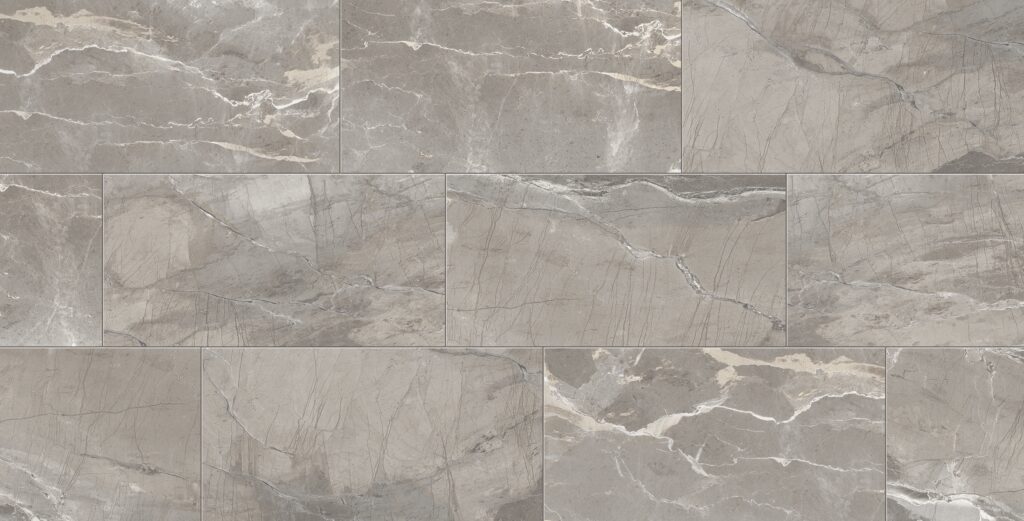 A gray marble tile floor with different shades of grey.