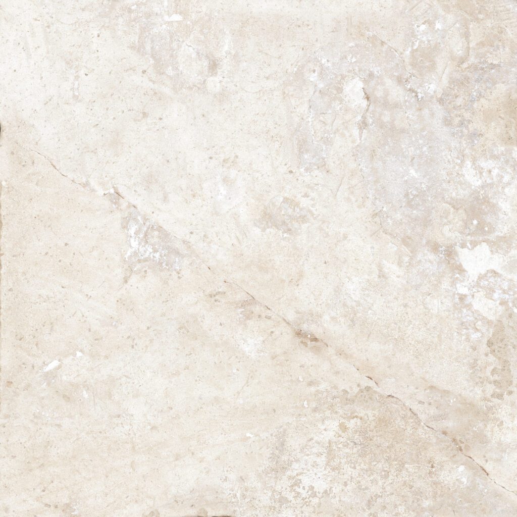 A white marble background with some brown spots