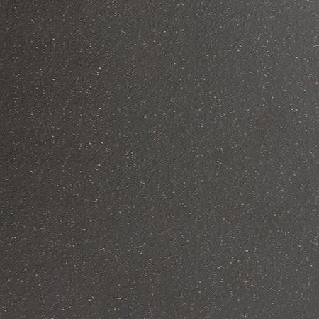 A black surface with some white dots on it