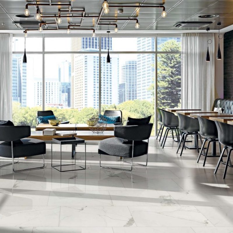 A modern dining room with a 31000 FLOOR table and chairs.