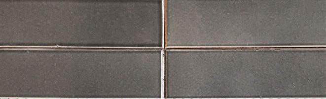 A close up of the four tiles on the floor