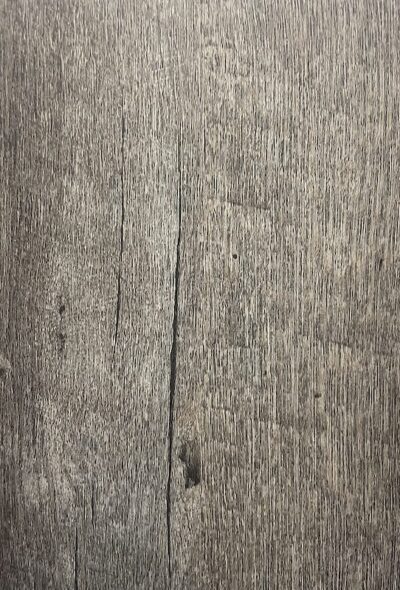 A close up of the wood grain on a surface