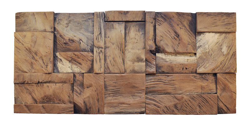 A wooden wall with many different wood blocks