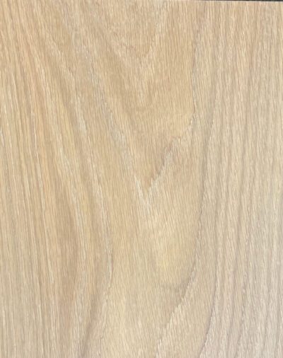 A close up image of A Woman in Love (It's Not Me) wooden surface.