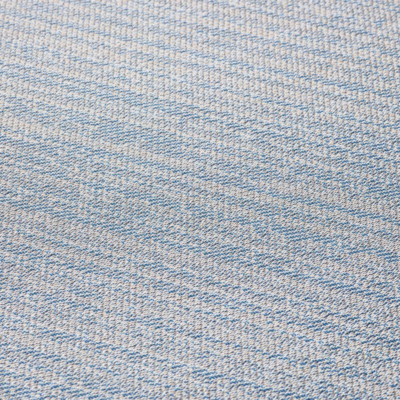 A close up of an Azurite blue and white striped fabric.