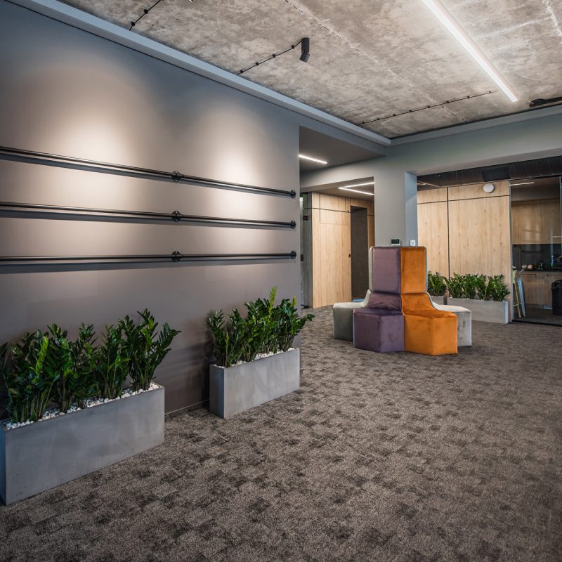 An office with Galena plants and a Galena concrete floor.