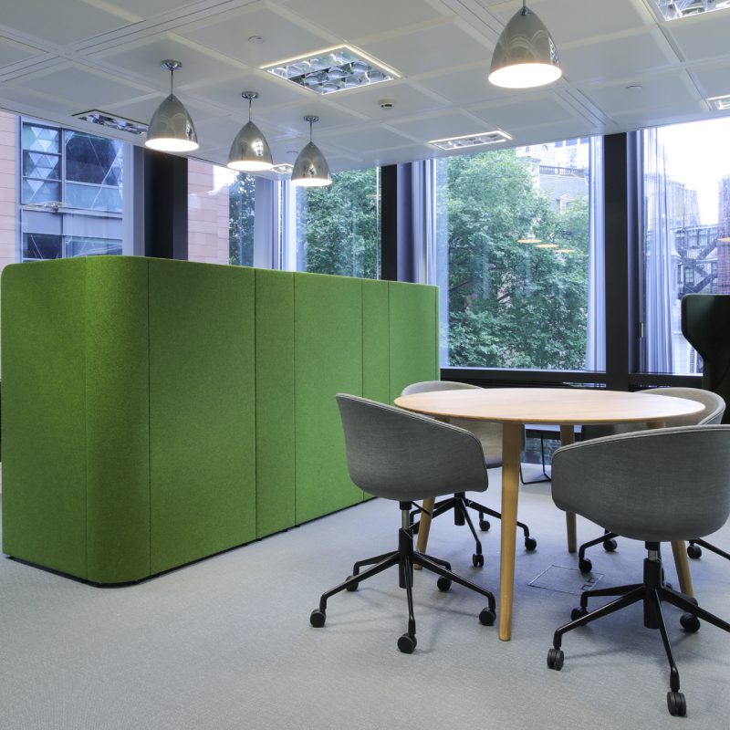 A green office with a Titan table and chairs.
