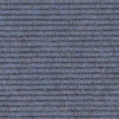A close up image of a blue 512 carpet.