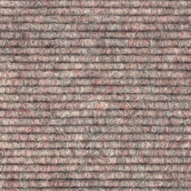 A close up image of a grey carpet.