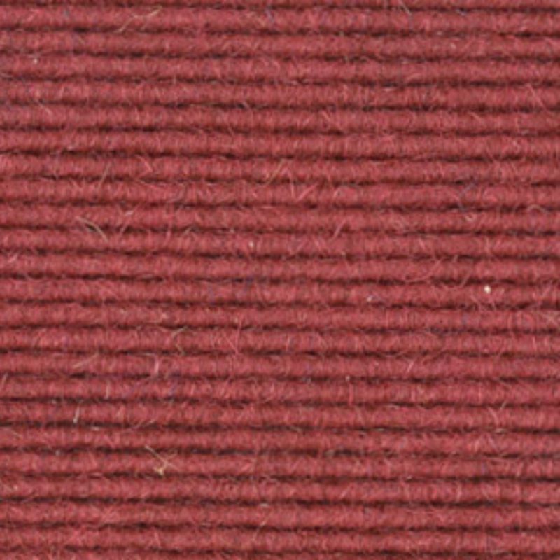 A close up image of a red carpet.